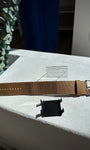 Bracelet STAMPS Antique Gold posé sur table
