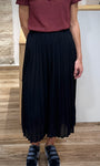 Jupe plissée noire coupe droite mi-haute pour femme