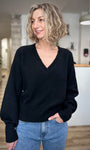 Pull femme noir manches longues et maille douce