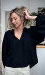 Blouse noire chic et romantique pour femme