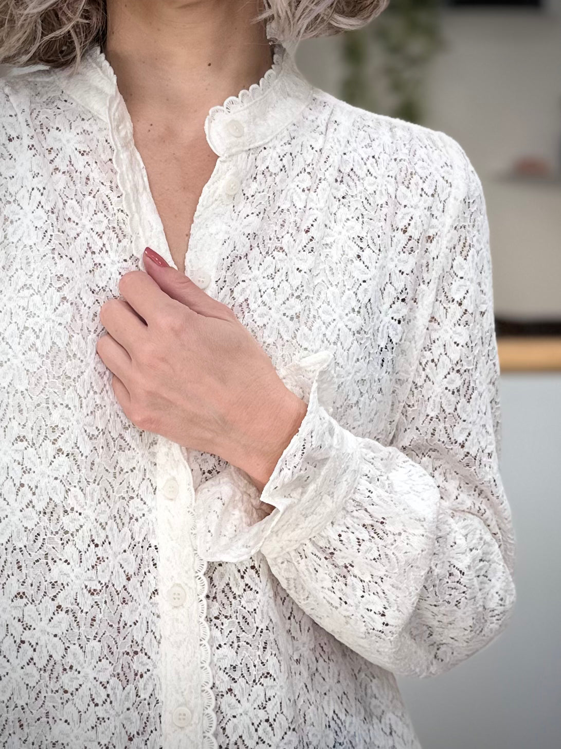 Détail du galon en dentelle sur le devant