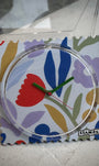 Gros plan cadran STAMPS fleurs avec aiguilles vertes 