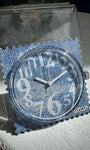 Gros plan cadran STAMPS Denim Time avec numéro blanc