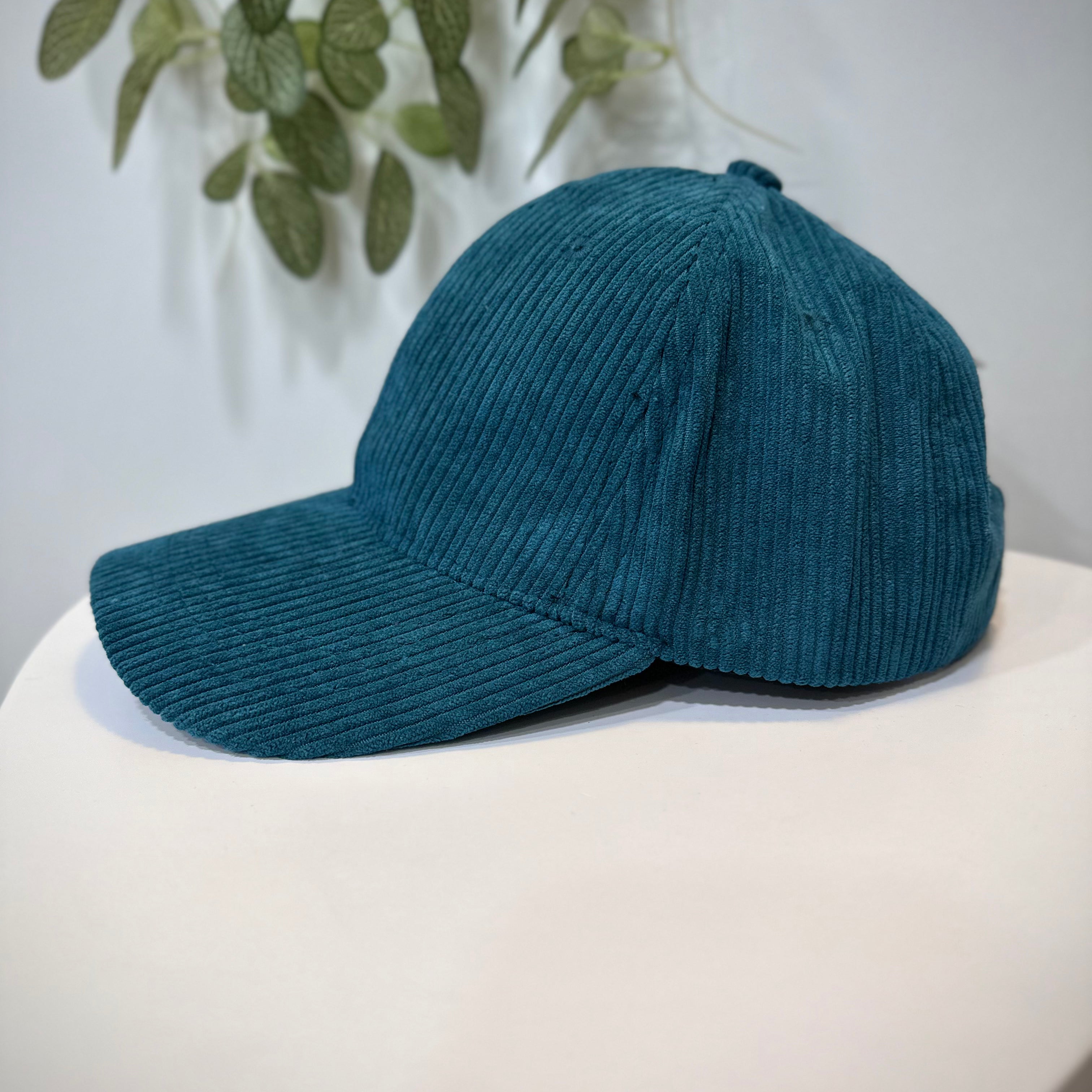 Vue latérale casquette femme bleu canard
