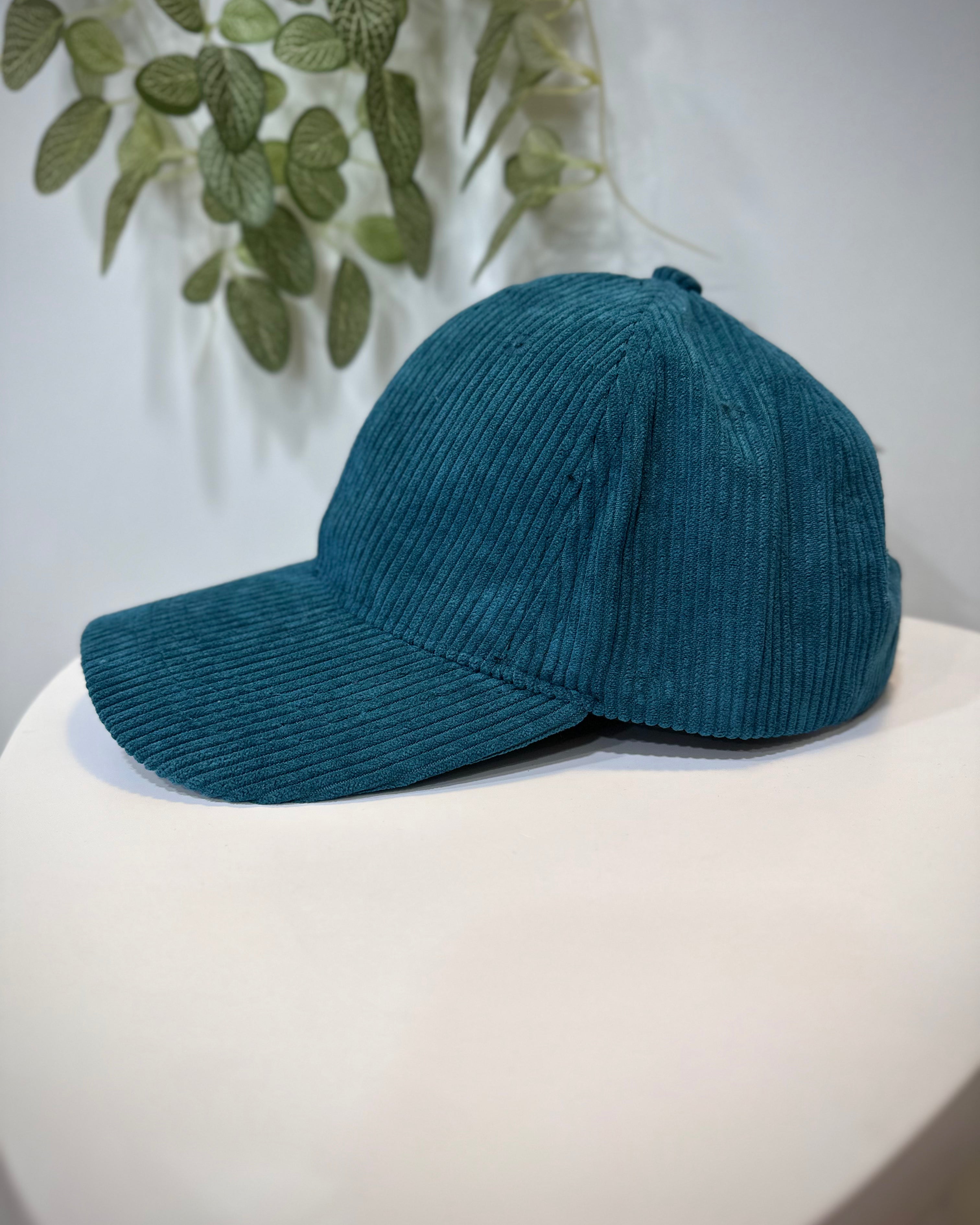 Vue latérale casquette femme bleu canard