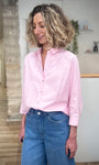 Chemise rose lumineuse style moderne 