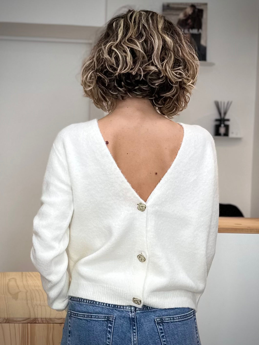 Gilet blanc réversible col V dans le dos