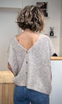 Gilet reversible porté col V dans le dos