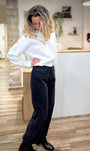 Jean baggy noir femme avec ourlet entroussé