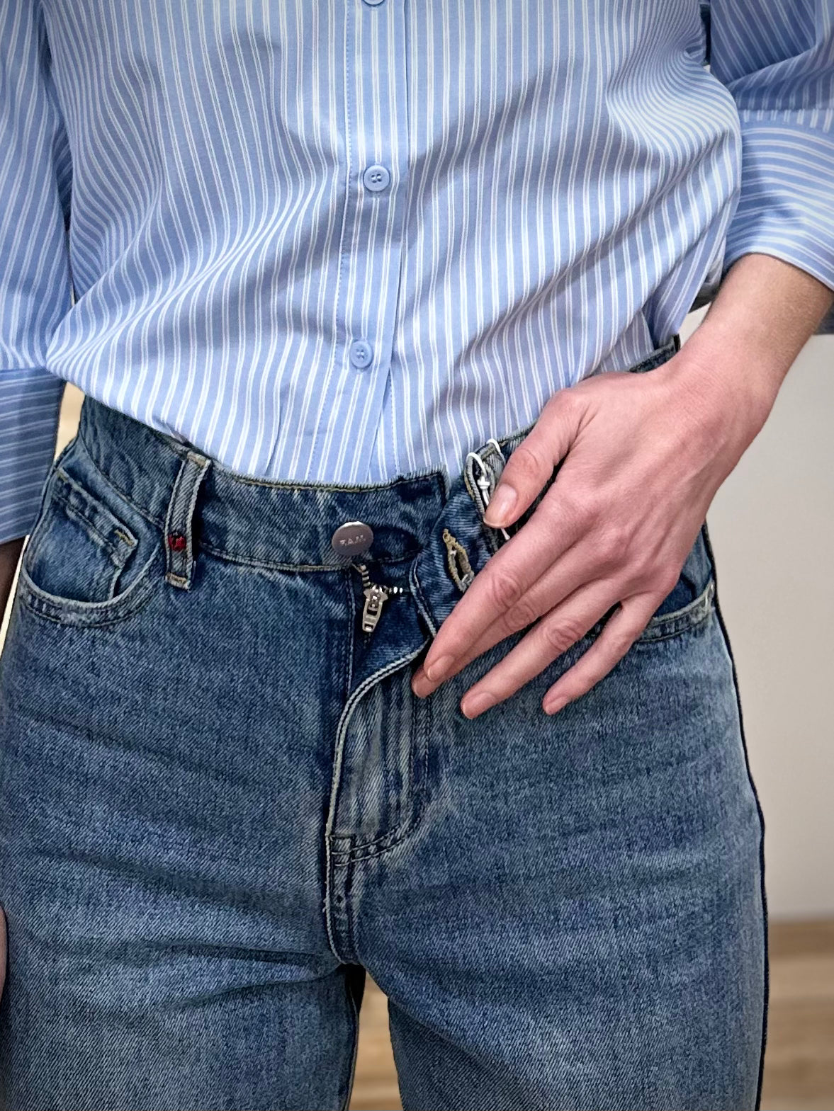 Détail fermeture zip jean pola long