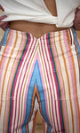 Détail V au dos pantalon taille haute femme