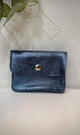 Porte-monnaie en cuir bleu jeans modèle Solea sur fond clair
