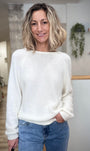 Pull ample ivoire en maille pour une silhouette douce et affirmée