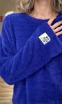 Détail du smiley All Good Fun sur le pull NAELLE