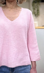 Détail maille pull femme rose