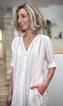 Robe bohème chic écrue à motifs colorés 