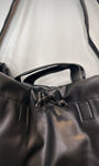 Détail du lien coulissant du sac noir
