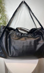 Vue de dos du sac cabas noir minimaliste