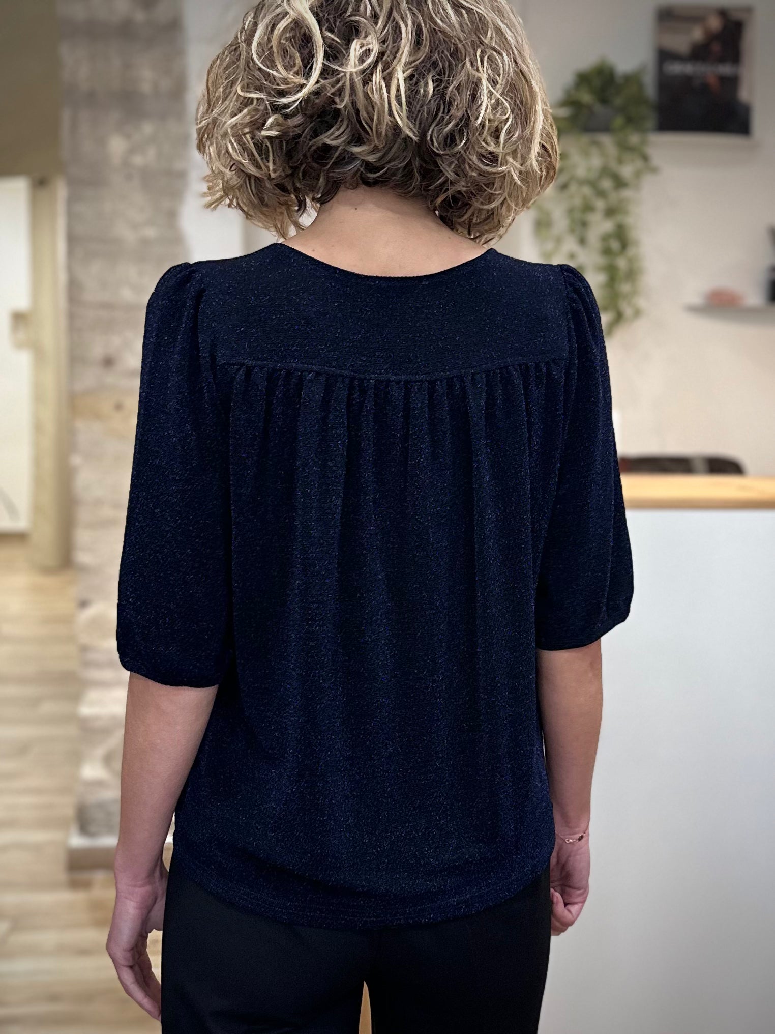 Vue dos top lurex avec fronces