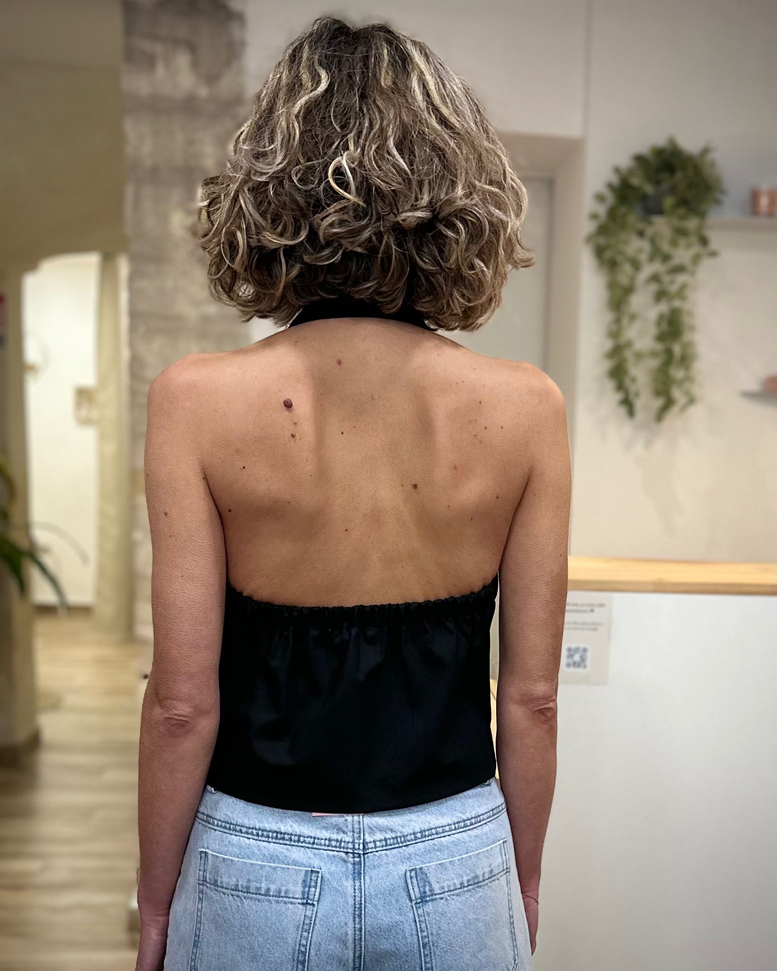 Détail bande élastiquée dos top veston