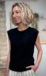 Top noir femme silhouette moderne élégante 