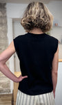 Top noir femme silhouette moderne élégante de dos